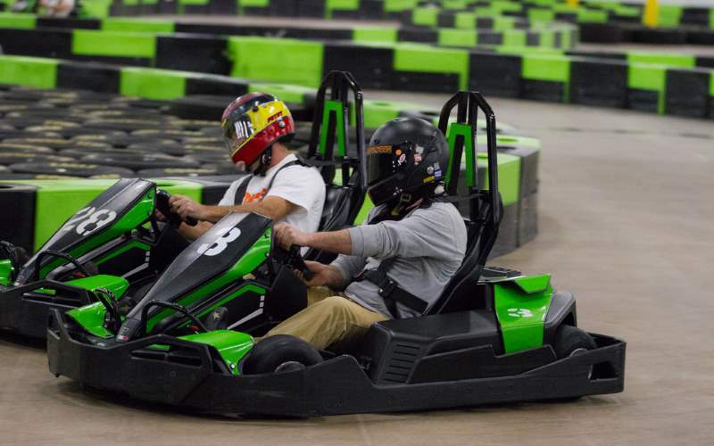two boys on go karts